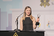 Firmex Team Lead for Client Services accepts Stevie Award
