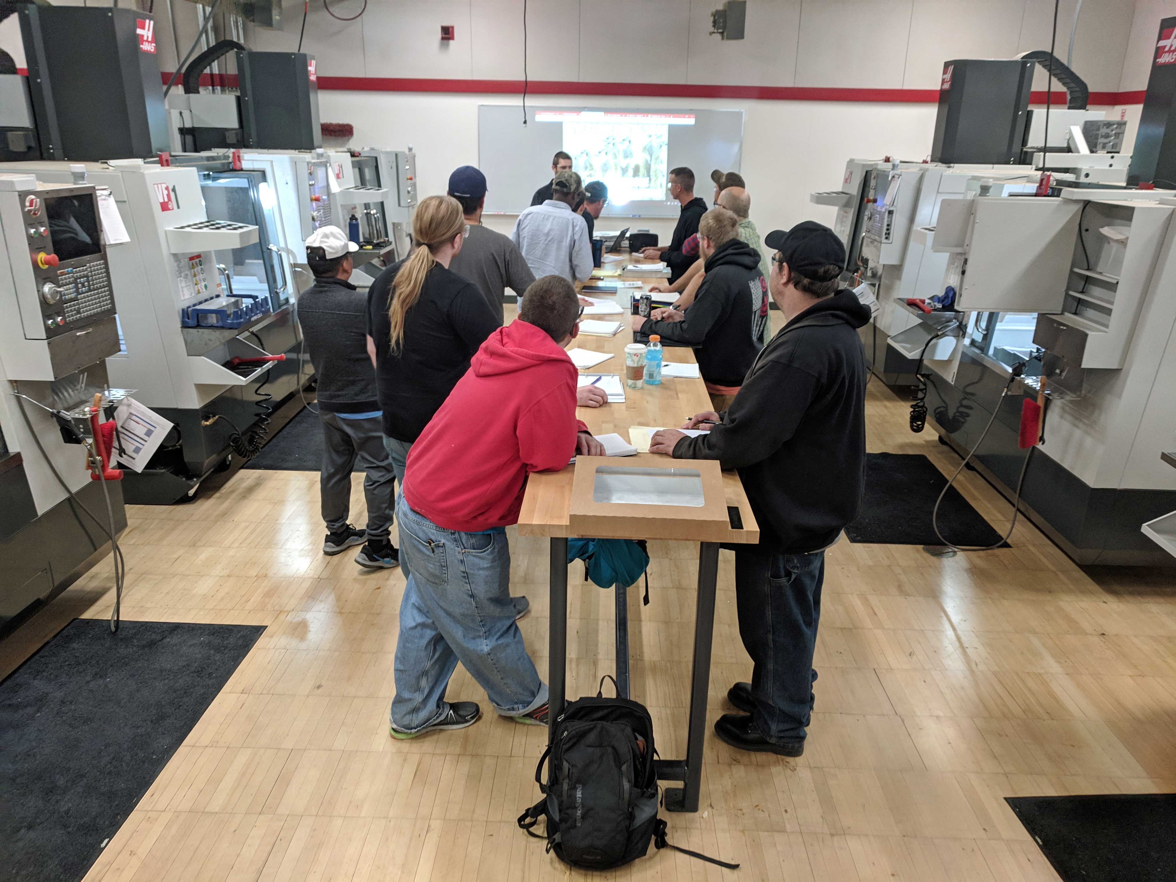 The Sacramento Valley Manufacturing Initiative held CNC training at the Sierra College Haas Center for Advanced Manufacturing by Design to prepare trainees for machinist apprenticeships.