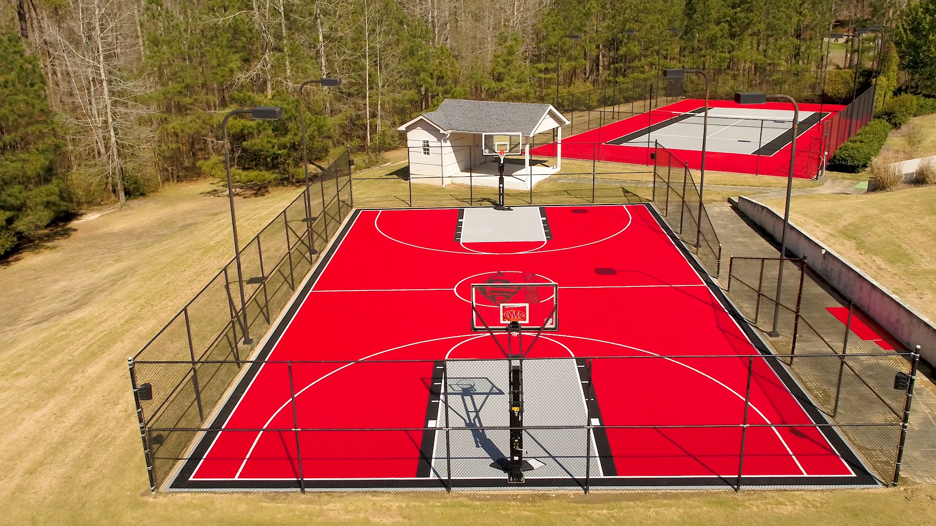 Sky view of Ludacris' SnapSports full basketball and tennis courts located on his property in Georgia.