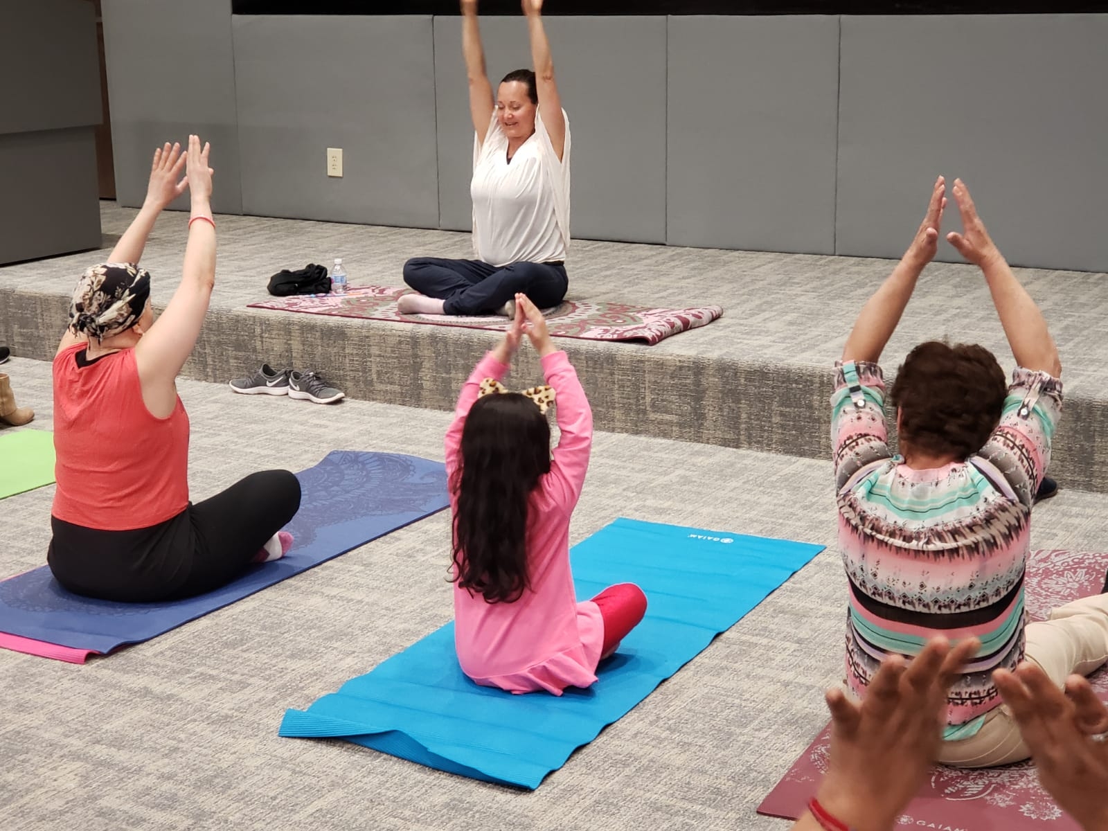 Participants finding peace through Yoga and Meditation