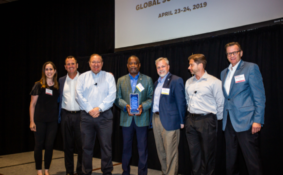 Chemico President & CEO Leon Richardson (center) accepts the Honeywell Innovation Award.
