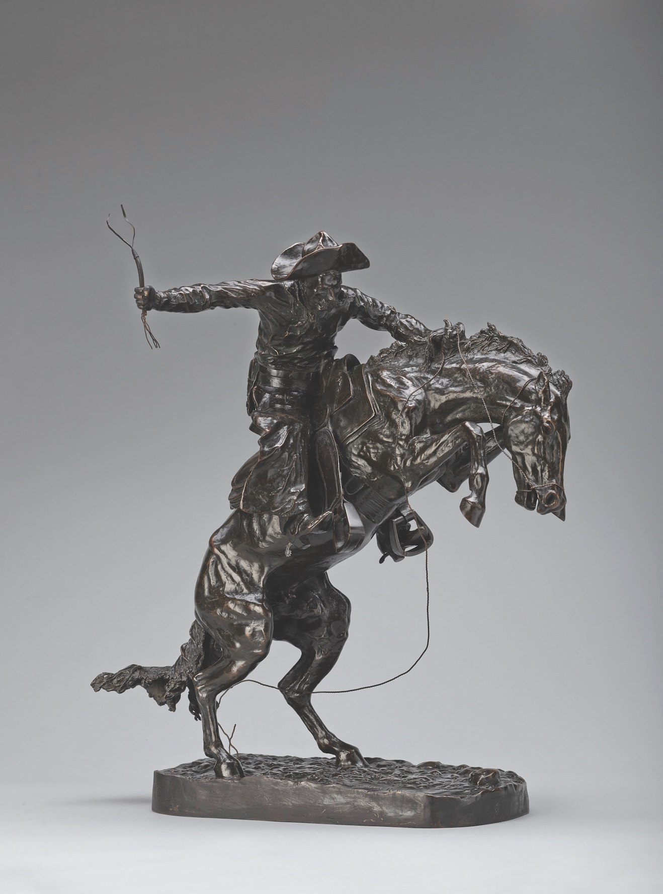Frederic Remington, The Broncho Buster, modeled 1895 (cast before May 1902). Bronze, Roman Bronze Works, Cast number 12, 23 1/4 x 22 x 13 in.  The Roath Collection, Denver Art Museum, 2013.91.