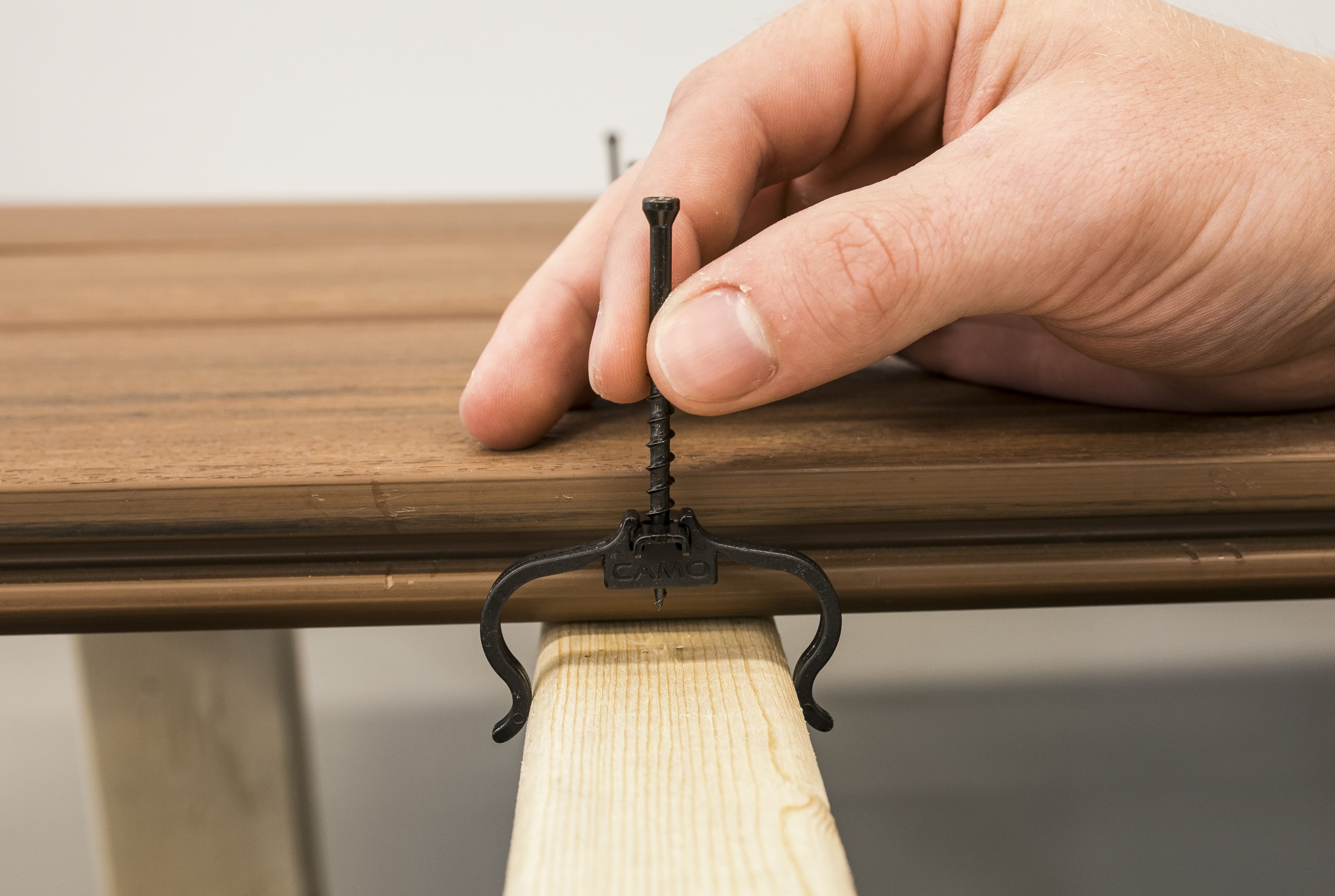 EdgeClip is another way to get a smooth, fastener-free surface that is safer for bare feet and reduces trip hazards from popped screws.