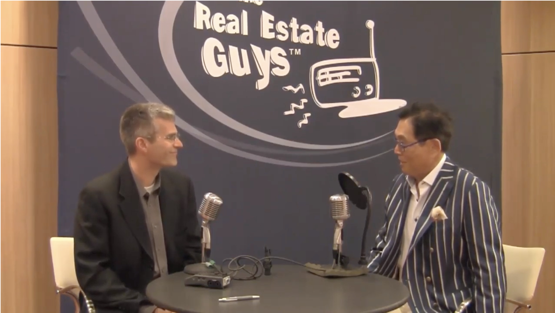 Real Estate Investor, Author and Apartment Building Podcast Host interviews Robert Kiyosaki about his new book "FAKE" during The Investor Summit at Sea hosted by The Real Estate Guys Radio™ Show