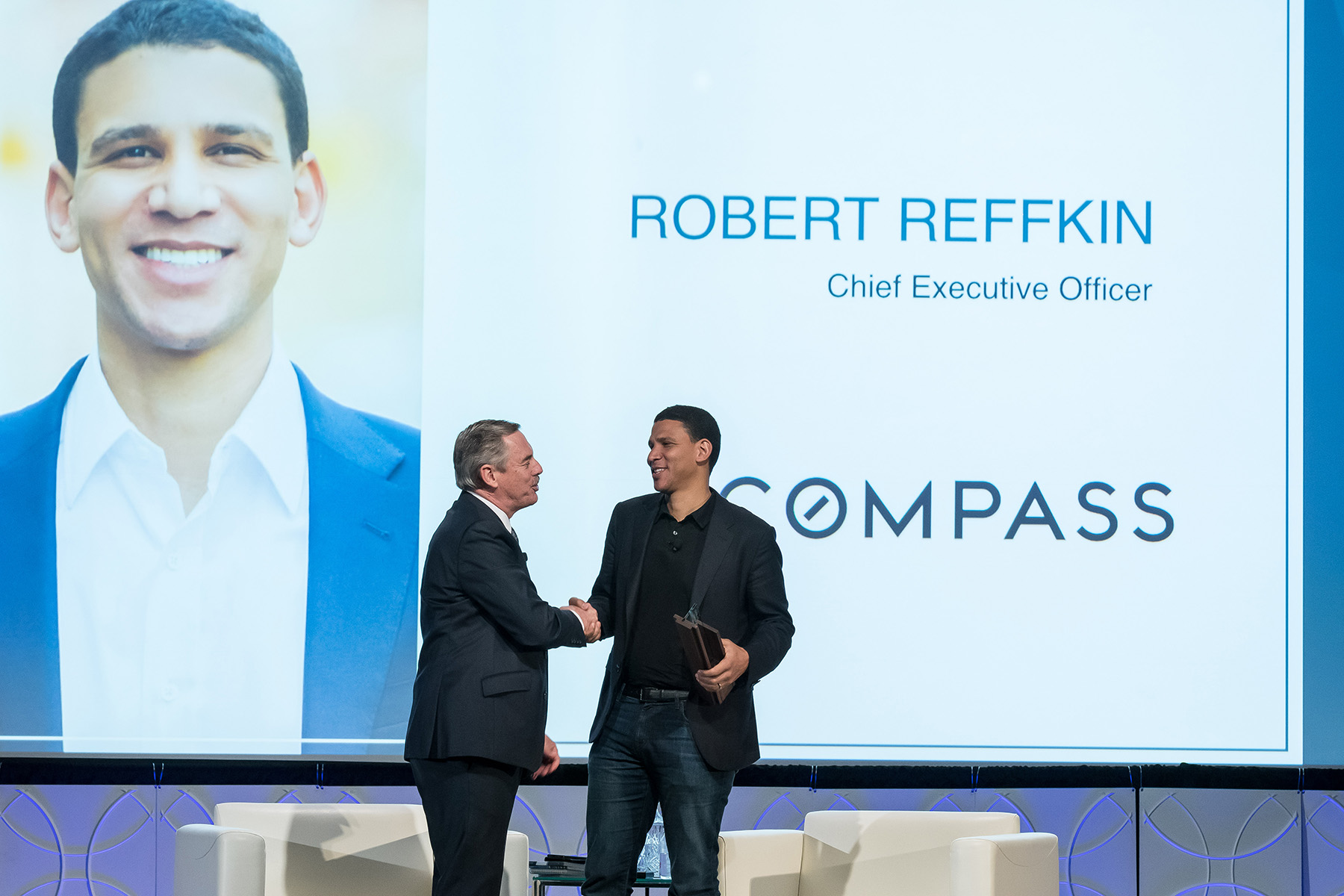 Stefan Swanepoel presents Robert Reffkin, CEO of Compass with 2019 Visionary Award.