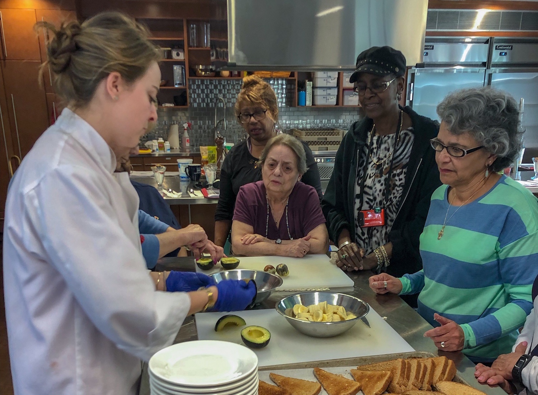 Chef Emilie Berner demonstrates a healthy recipe for members of the City of Peekskill’s Senior Nutrition Program.