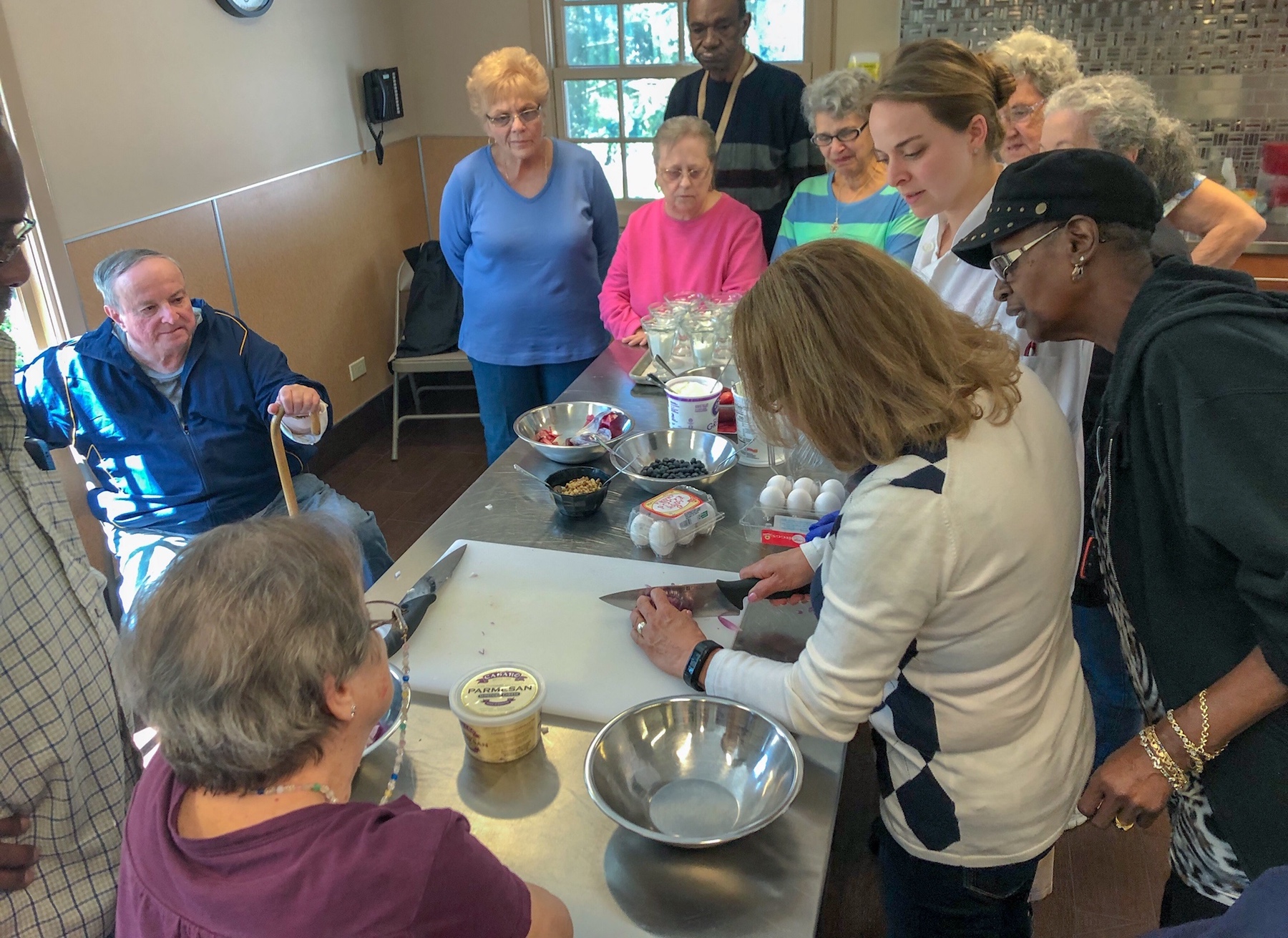 Members of the City of Peekskill’s Senior Nutrition Program try their hand at creating a health-supportive meal as part of the “Cooking for Health” program.