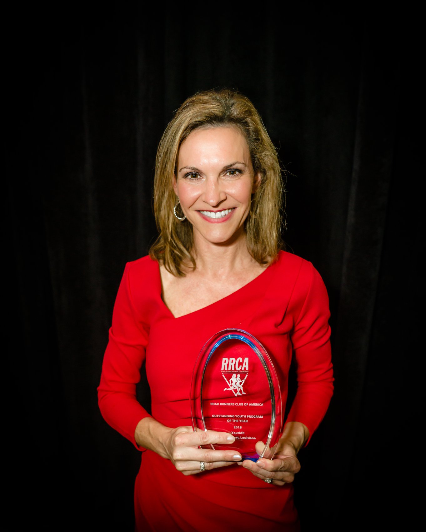 Walden University’s Dr. Shelley Armstrong Receives Outstanding Youth Program Award from Road Runners Club of America