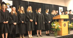 Graduates in line at podium