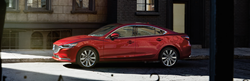 Red 2019 Mazda6 on a City Street