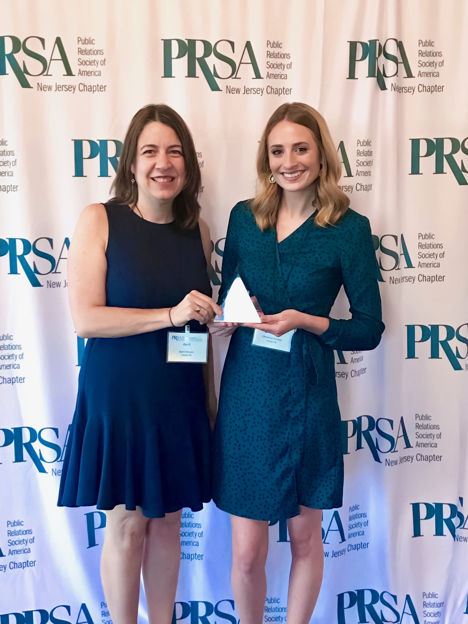 L-R: April Mason and Christina Forrest of Violet PR are shown after winning a PRSA NJ Pyramid award on June 12, 2019.