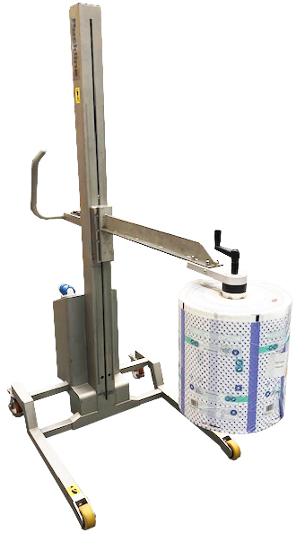 The roll lifter with extended reach is designed to load rolls vertically into a packing or processing machine