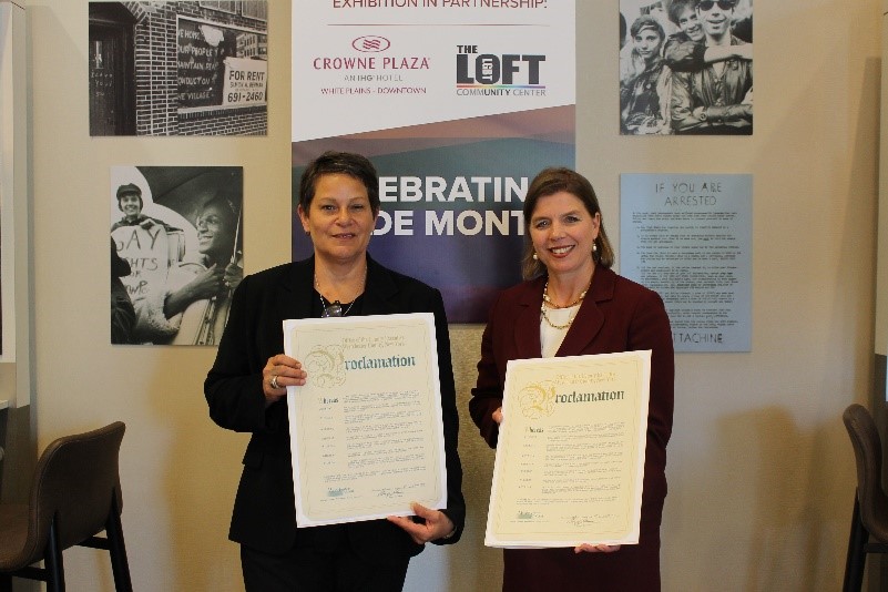 L-R: Judy Troilo, Monika Henry holding proclamations from the Office of County Executive George Latimer.