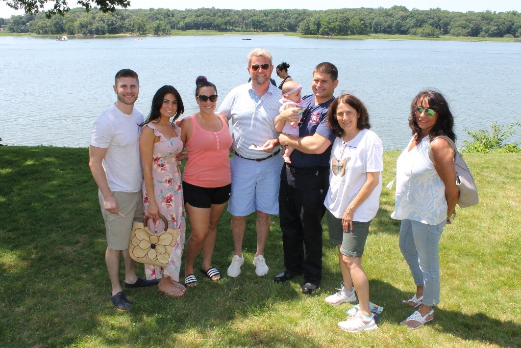 Christine Duff (second from right), HOW staff nurse, and her family.