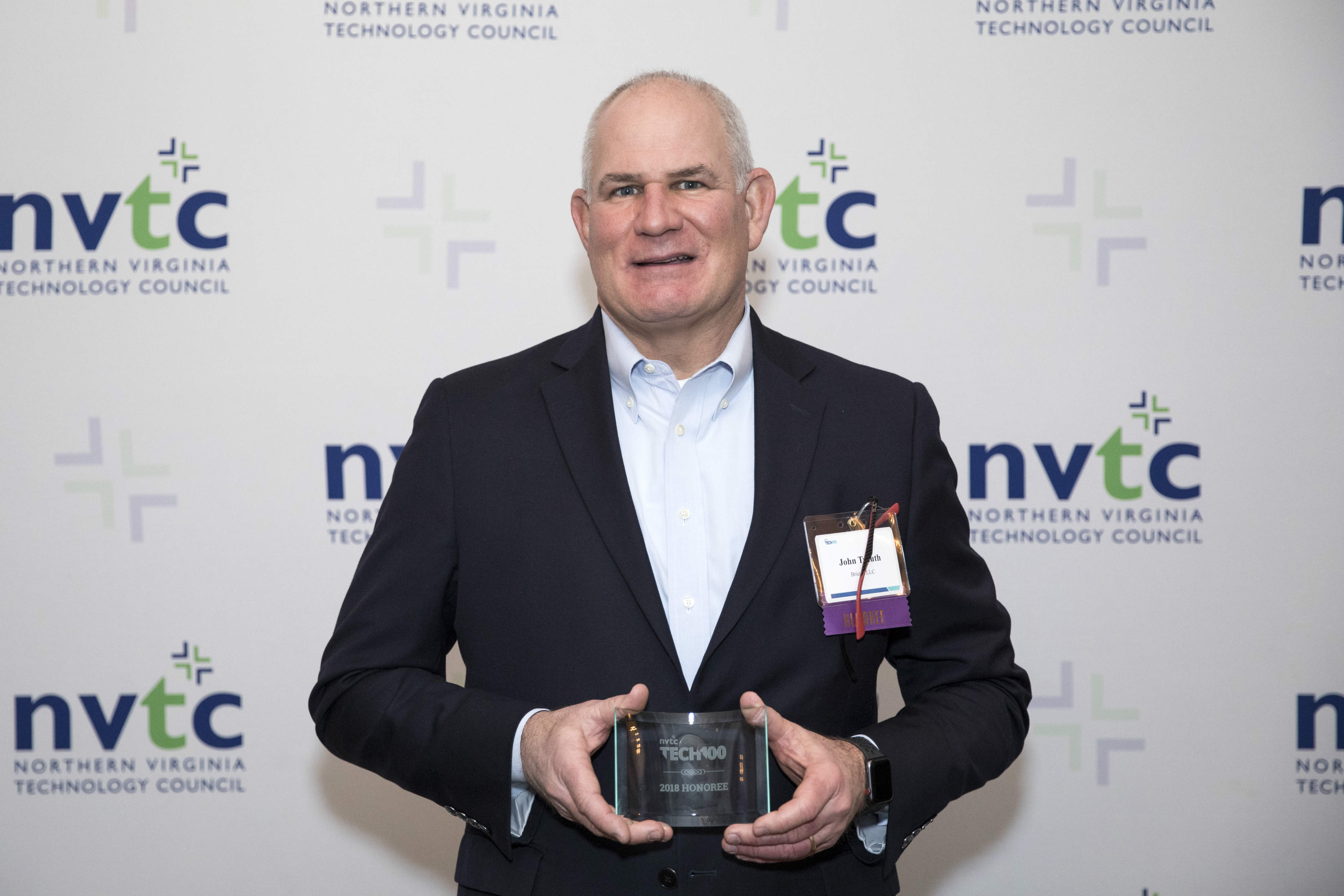 Bricata CEO John Trauth accepting the award for being named to the inaugural NVTC Tech 100.