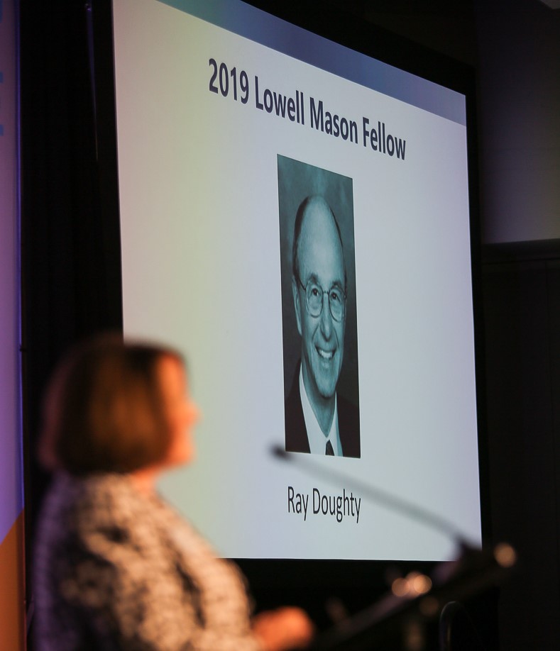 Kathleen D. Sanz, NAfME President and Board Chair, presents the 2019 Lowell Mason Fellow at the NAfME National Leadership Assembly in Washington, DC. Photo: Ashlee Wilcox Photography.