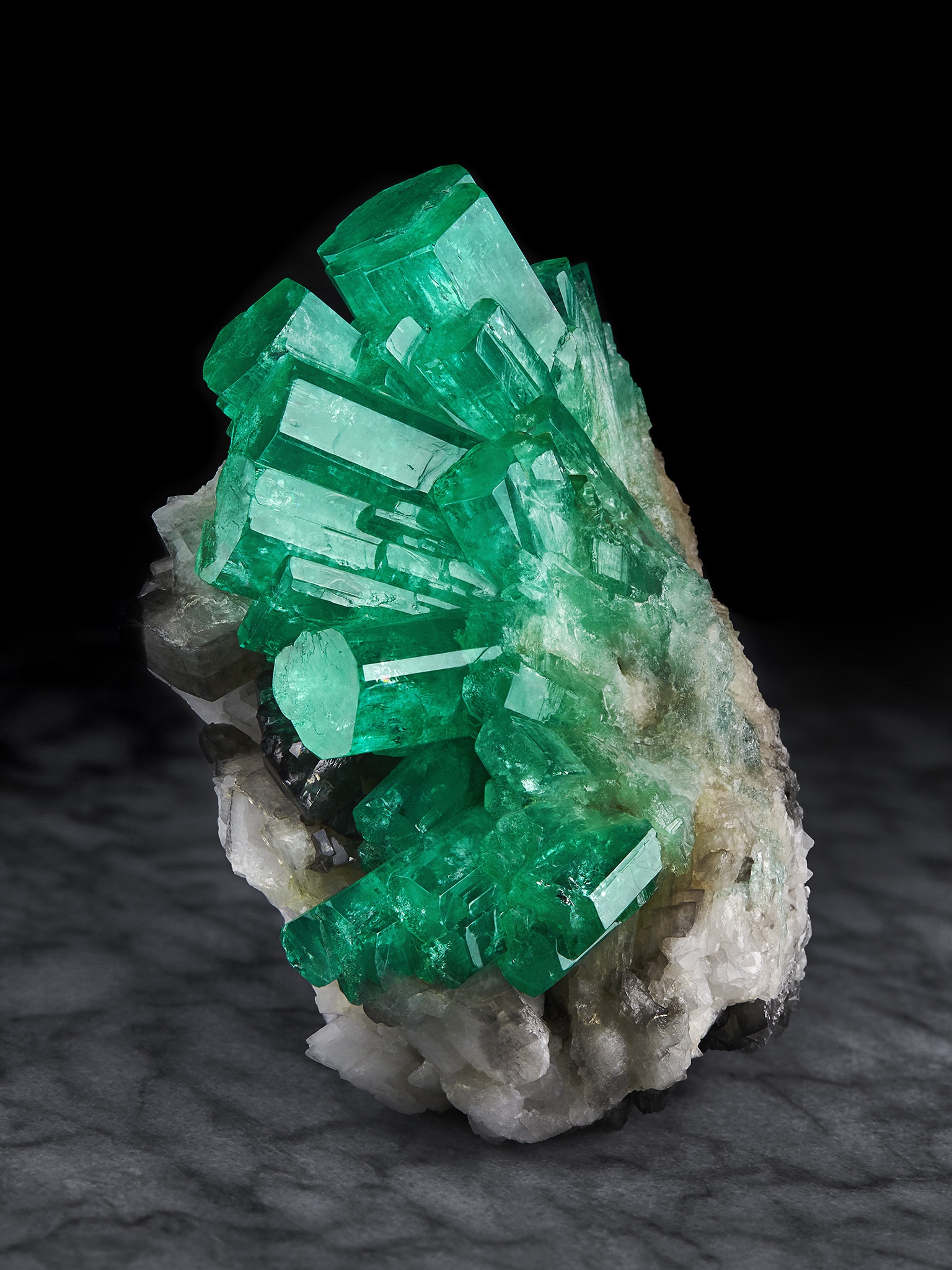 Emerald on Calcite, Coscuez Mine, Muzo Municipality. Rice Northwest Museum Collection. Image by Evan D'Arpino.