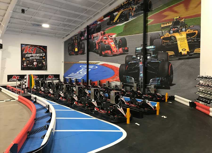 All-electric go karts sit in the pits at K1 Speed Bend