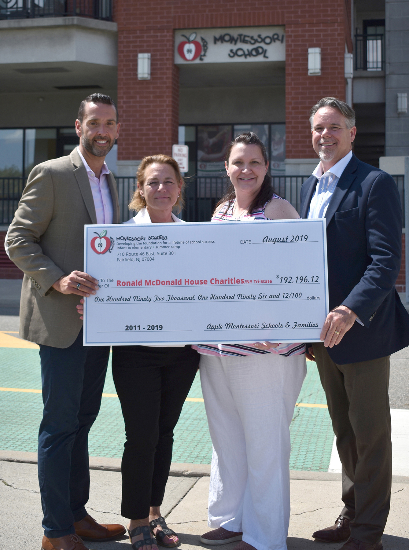 From left to right: Matthew Campo and Janice Mulligan, RMHC; Rebecca Fish and Richard Page, Apple Montessori Schools.