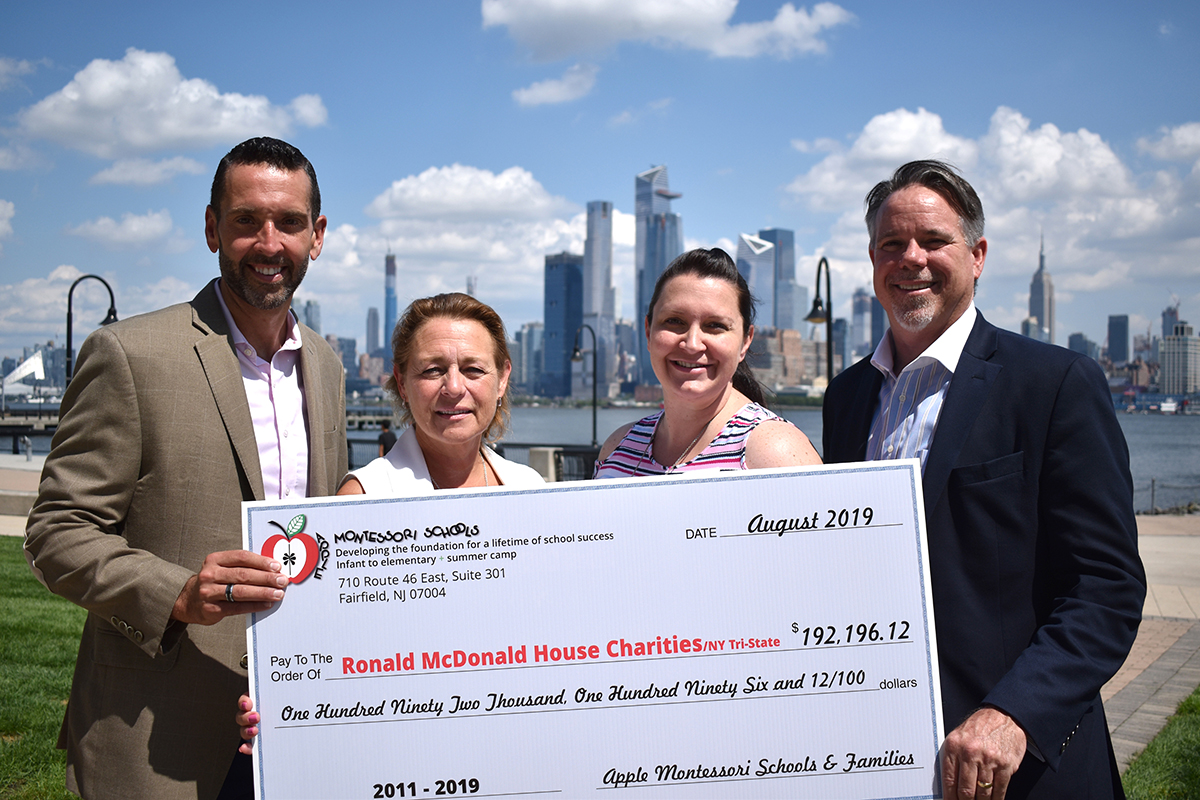 From left to right: Matthew Campo and Janice Mulligan, RMHC; Rebecca Fish and Richard Page, Apple Montessori Schools