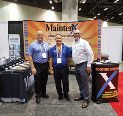 Three MaintenX service experts pose at their booth between helping industry peers at ICSC Florida Conference and Deal Making.