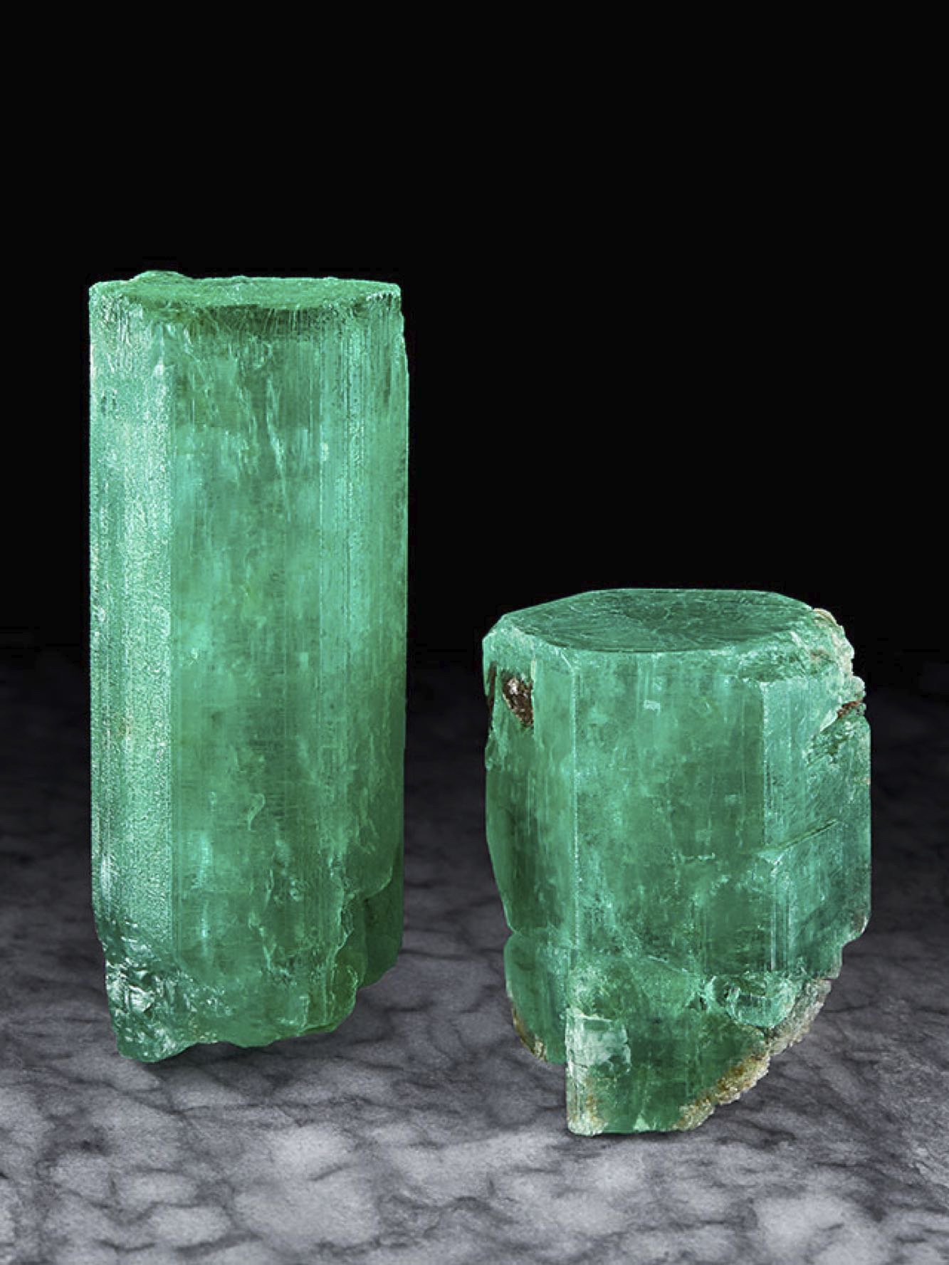 Emerald, Rist Mine, Hiddenite, Alexander Co., North Carolina.  Left: "LKA Emerald” Right: "Stephenson Emerald," Private Collection.