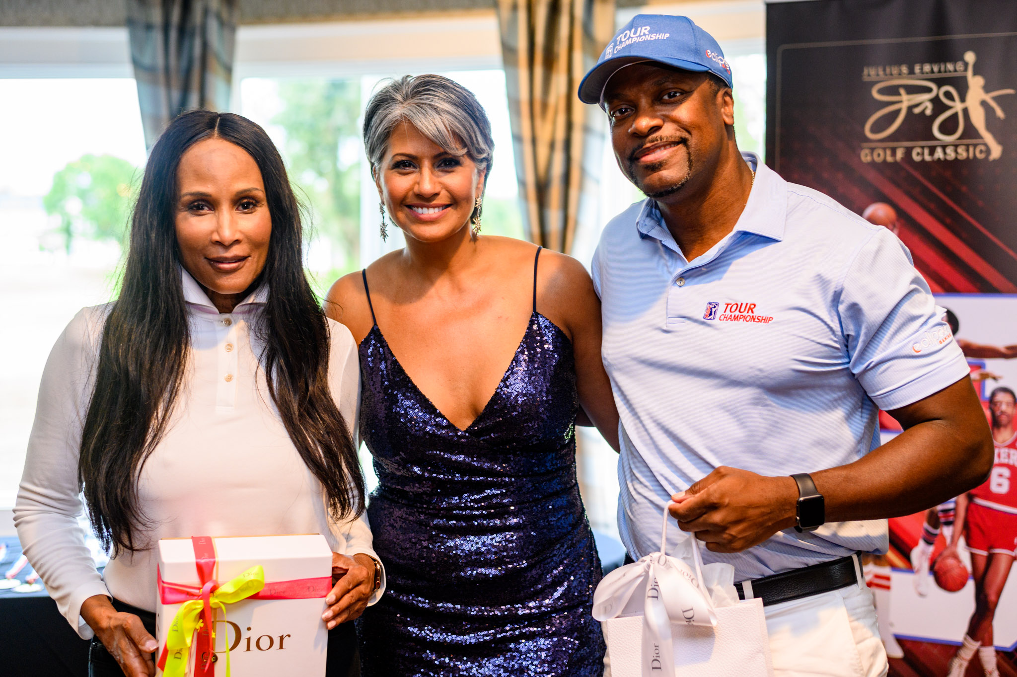 Supermodel Beverly Johnson (L), Glori Amador, Dior Beauty (C) and Actor & Comedian Chris Tucker (R) accept their best dressed awards at the 5th Anniversary of The Julius Erving Golf Classic