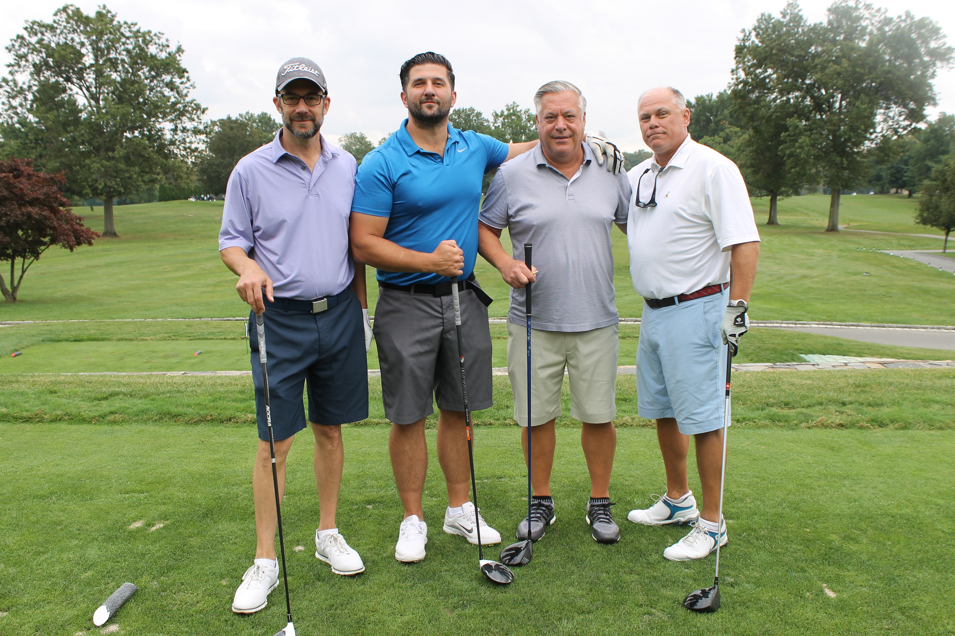 HOW Golf Invitational co-chair Joseph Kahl (second from right) and the Manhattan Beer Distributors foursome