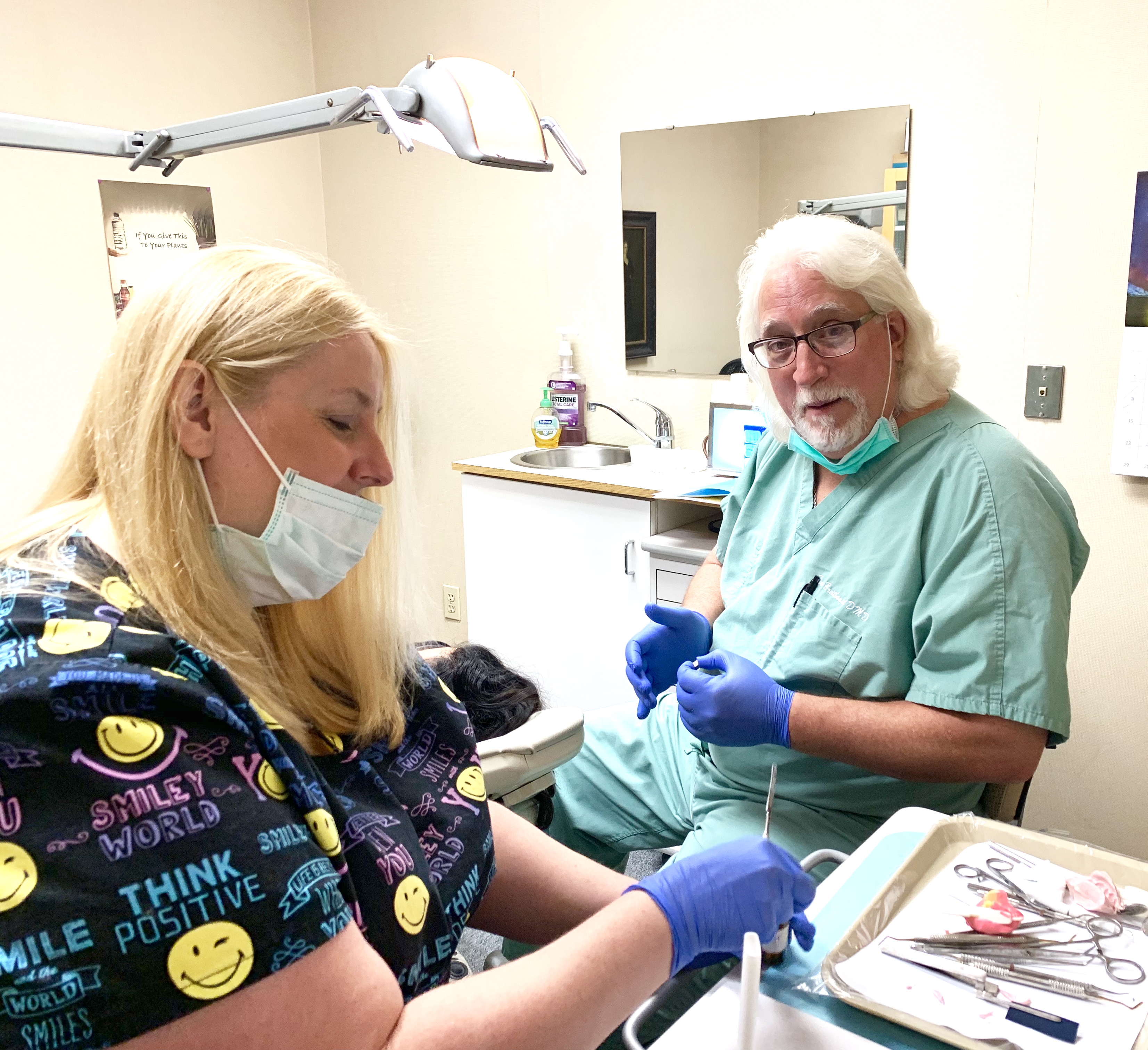 Dr Tom and Renee taking good care of our valued patients at Audubon Family Dentistry.