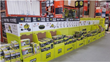 Peachtree Packaging & Display designs adaptable train point-of-purchase (POP) display out of corrugated cardboard for Ryobi Days annual BOGO sale.