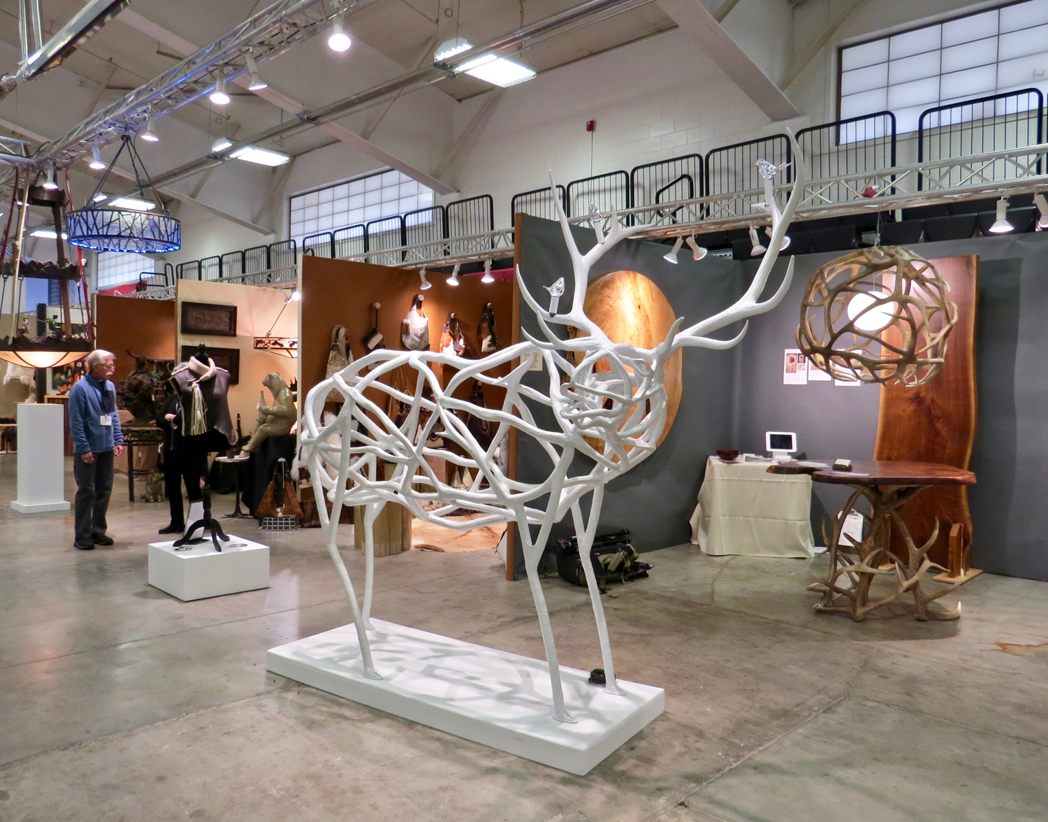 Shawn Rivett’s award-winning antler pieces on display in the Jackson Hole showroom of the Western Design Conference ranged from lighting to sculpture.