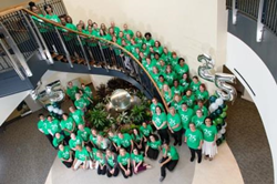 Mercy Medical Center clinical and lay staff gather to celebrate the 25th anniversary of The Center for Women's Health and Medicine.