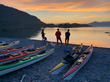 Composers and kayaks on beach at Sunset.