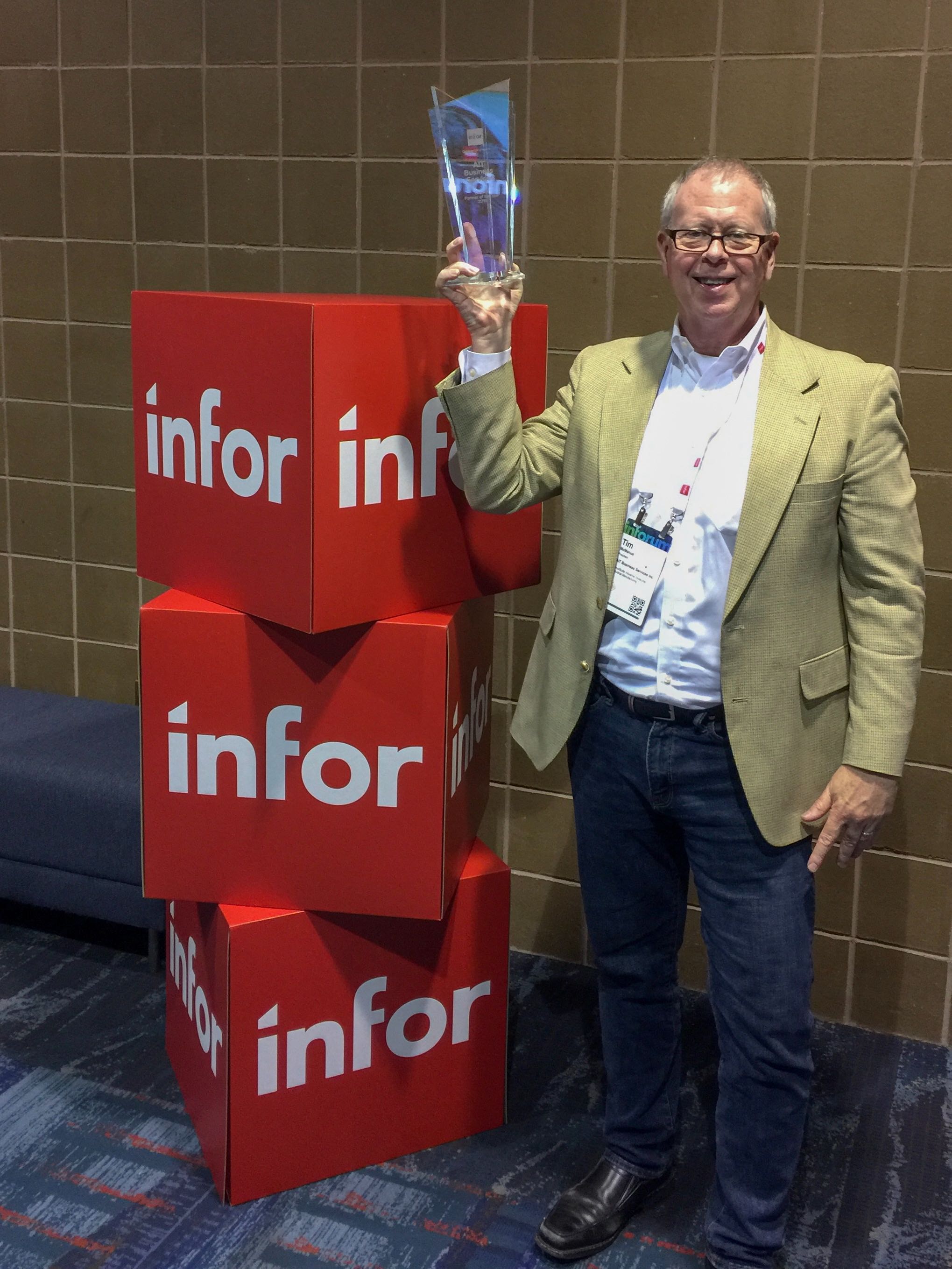 Tim McManus accepts Infor's 2019 Growth Partner of the Year Award!