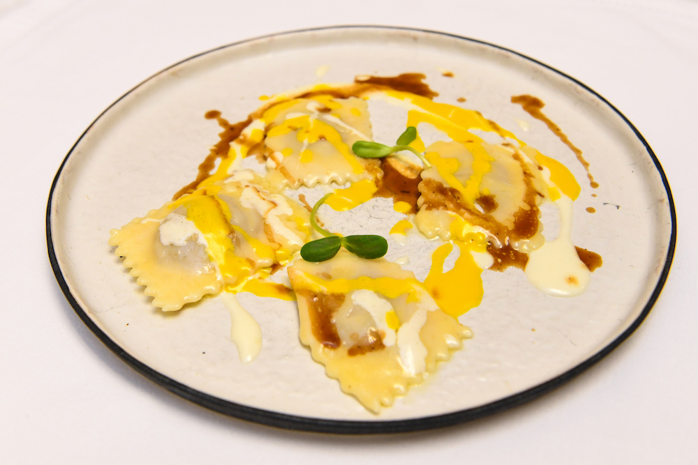 Veal Ossobuco Ravioli, Marrow Sauce, Saffron and Castelmagno Cheese by Chef Ferrarese