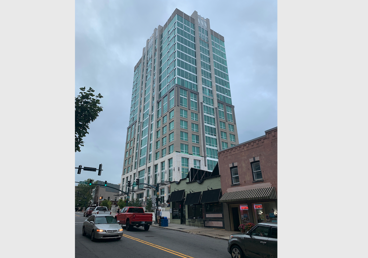 The Kimpton Hotel Arras rises above the skyline in downtown Ashville