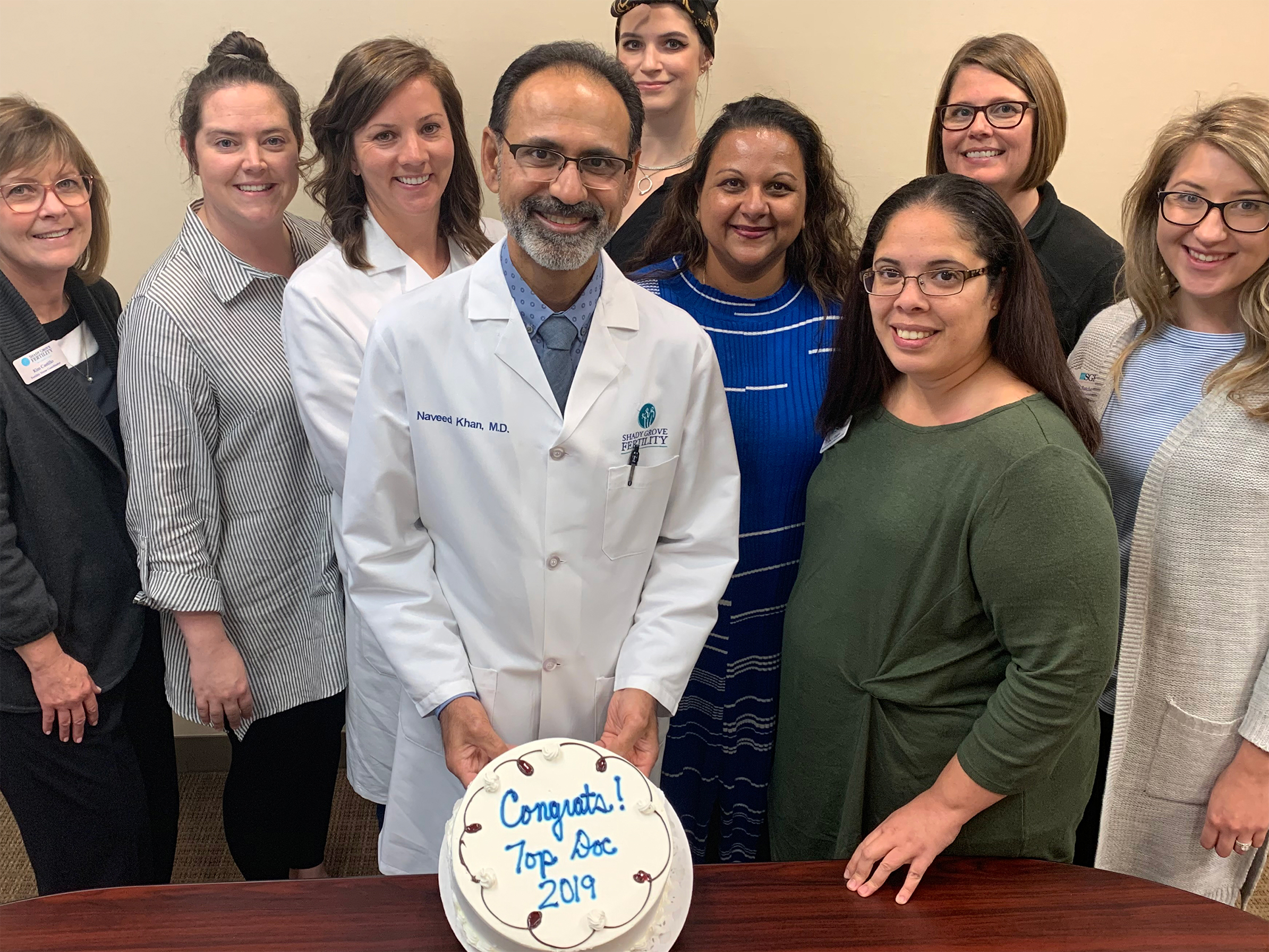 Naveed Khan, M.D. of Shady Grove Fertility celebrates with staff.