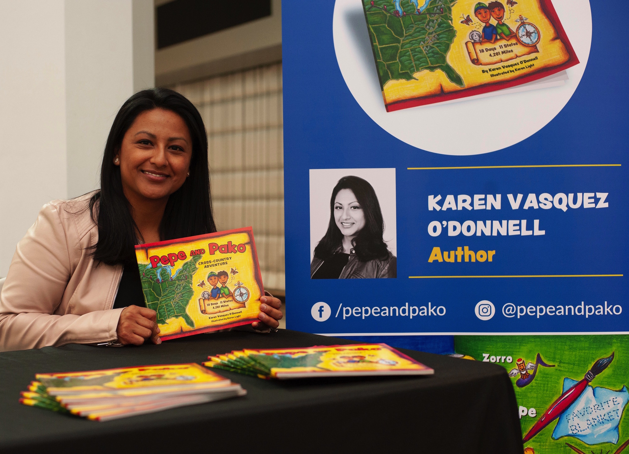 Children's author Karen Vasquez O'Donnell appears at a recent book signing event promoting her new work "Pepe and Pako: Cross-Country Adventure."