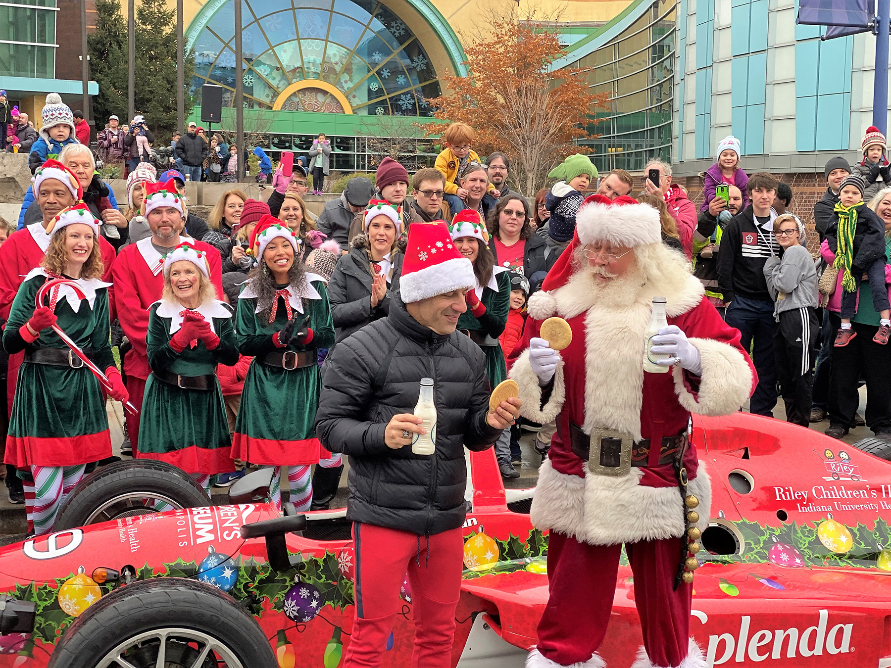Santa shares his first cookies and milk with former Indy 500 winner Tony Kanaan.