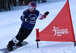 Paralympian Brittani Coury snowboarding at Ski Spectacular