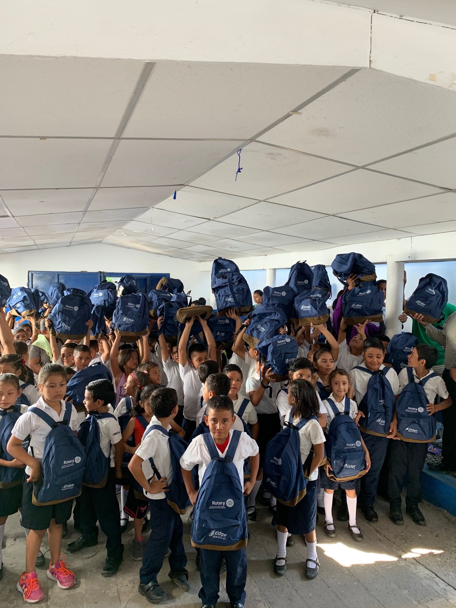 Children receive school supplies