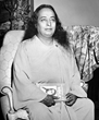 Paramahansa Yogananda in 1949 with a copy of his best-selling spiritual classic Autobiography of a Yogi.