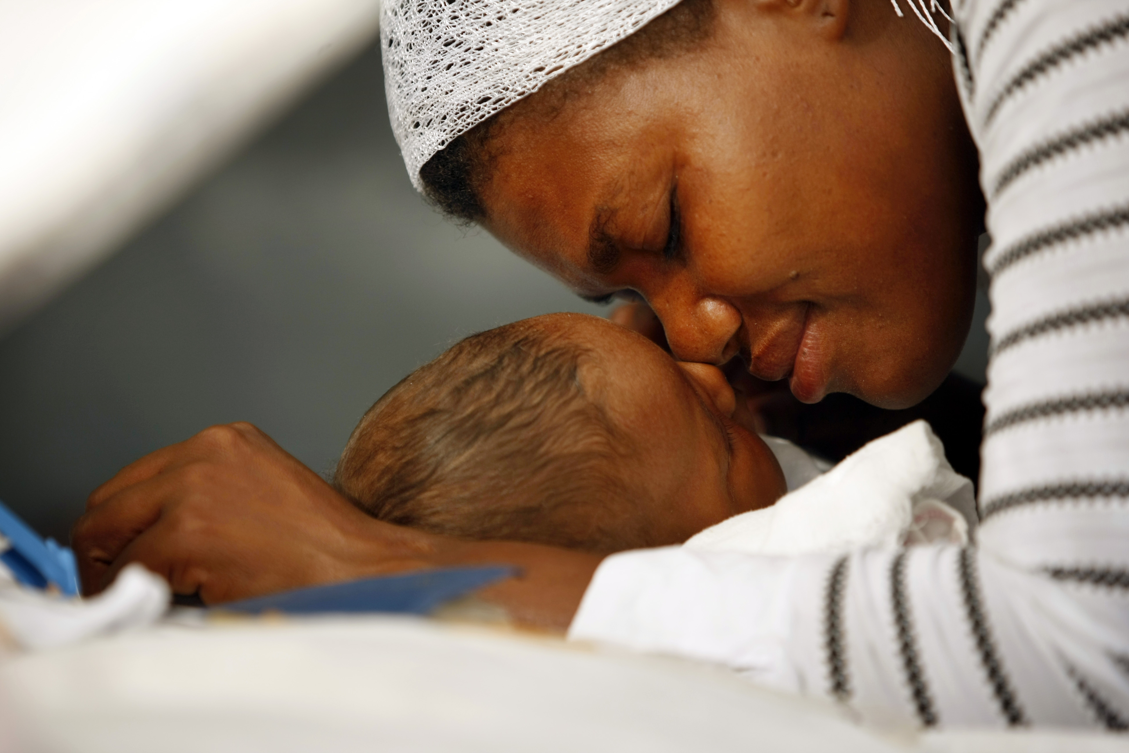 A mother and child in Haiti in the days after the 2010 Haiti Earthquake. Photo courtesy of Hope for Haiti.