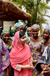 This photo taken by Tess Thomas for the Malala Fund shows how contagious her passion is as she visits with others who want an education.