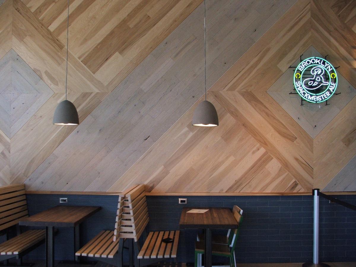 Pioneer Millworks Raked(TM) reclaimed Oak joins their Modern Farmhouse fresh sawn Hickory in a MI eatery. See both wood on display at IBS 2020 in Las Vegas.