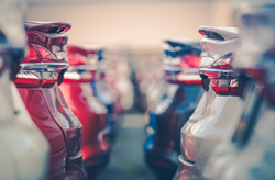 used car lot bumper to bumper stock photo depth of field