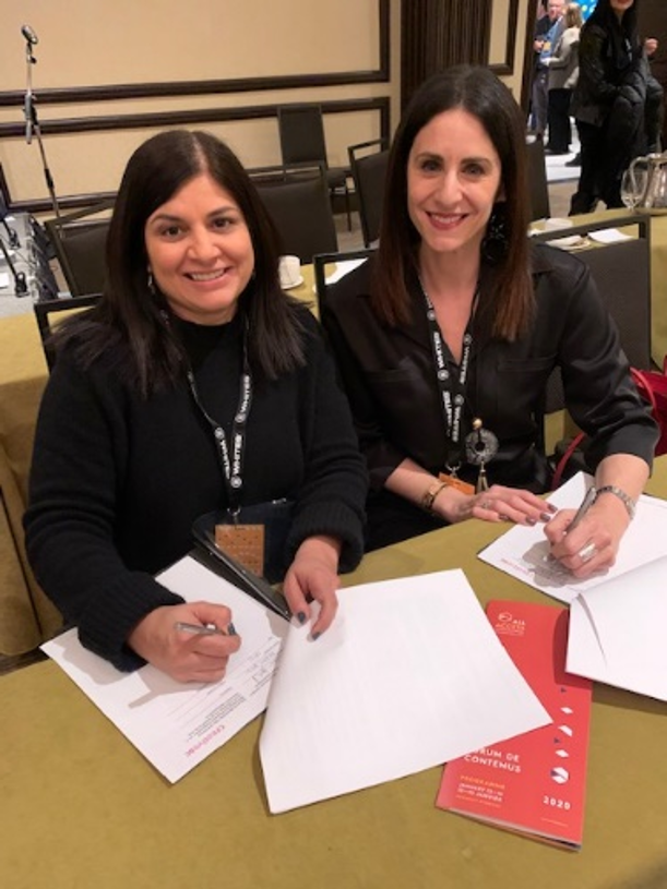 Manitoba Film & Music CEO/Film Commissioner Rachel Rusen Margolis (Right) signs MOU licensing Reel Green™ from Creative BC CEO Prem Gill (Left).