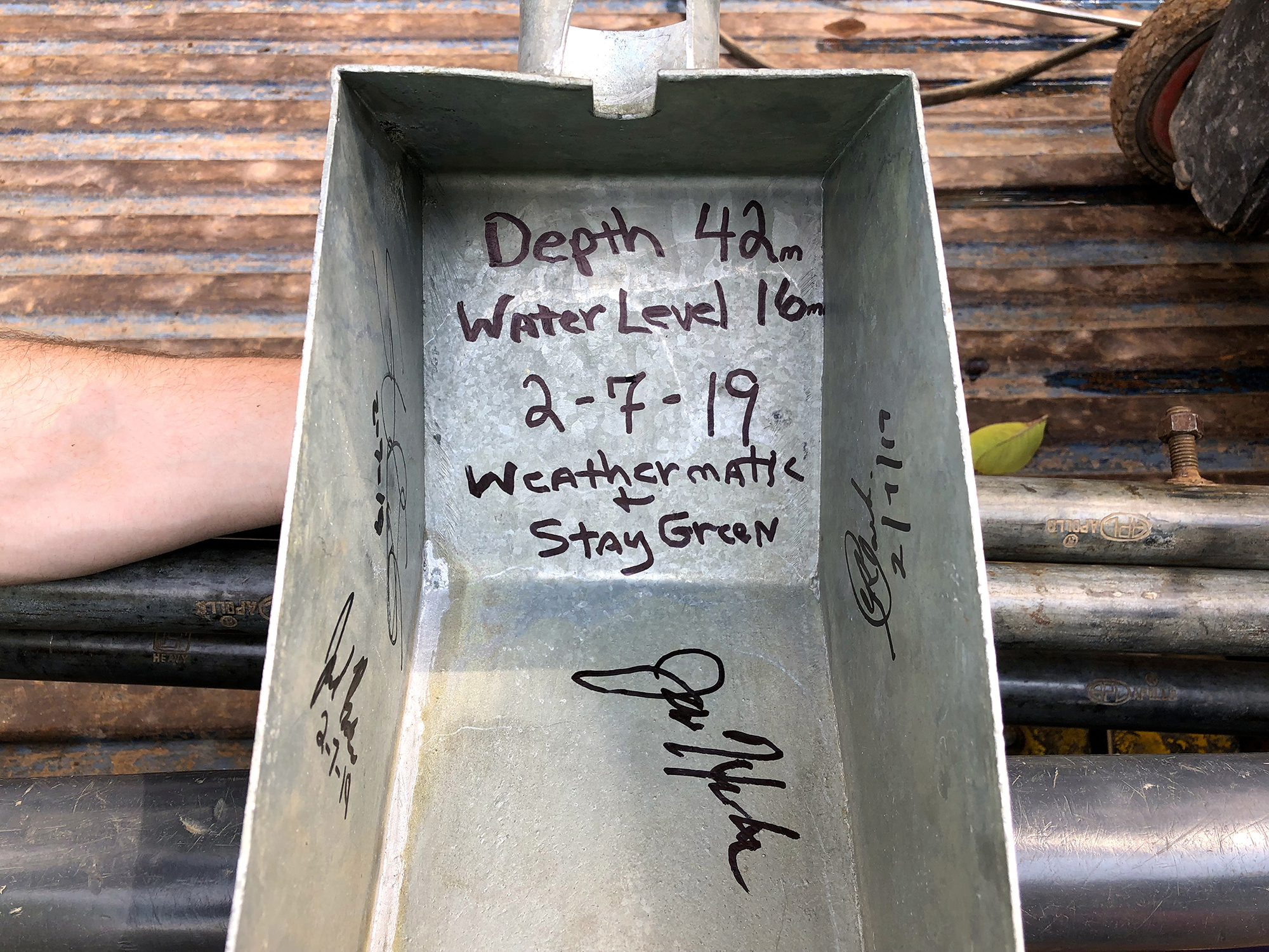 The team autographed a part of the well to celebrate the new installation.