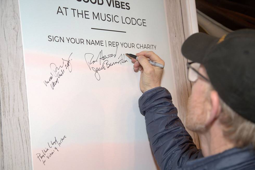 Ron Howard is among the first to sign the Good Vibes wall on behalf of Jacob Burns Film Center.