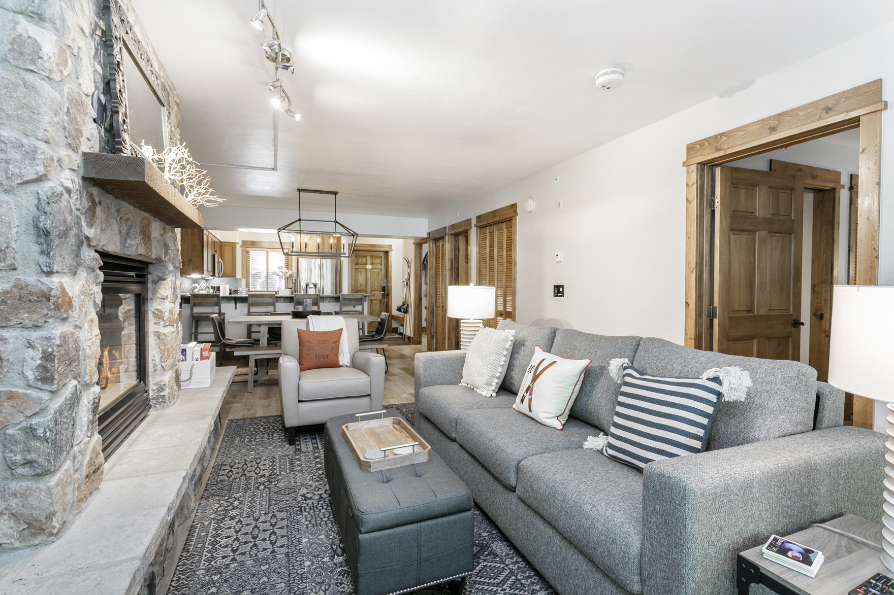 Antlers at Vail condos feature all the amenities of home including full kitchens, fireplaces and spacious living room areas for guests to enjoy after a day of Colorado skiing.